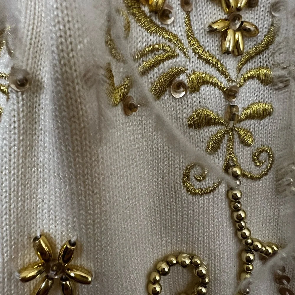 Elegant Cream and Gold Christmas Holiday Women's Sweater with Feather Trim - Picture 14 of 17